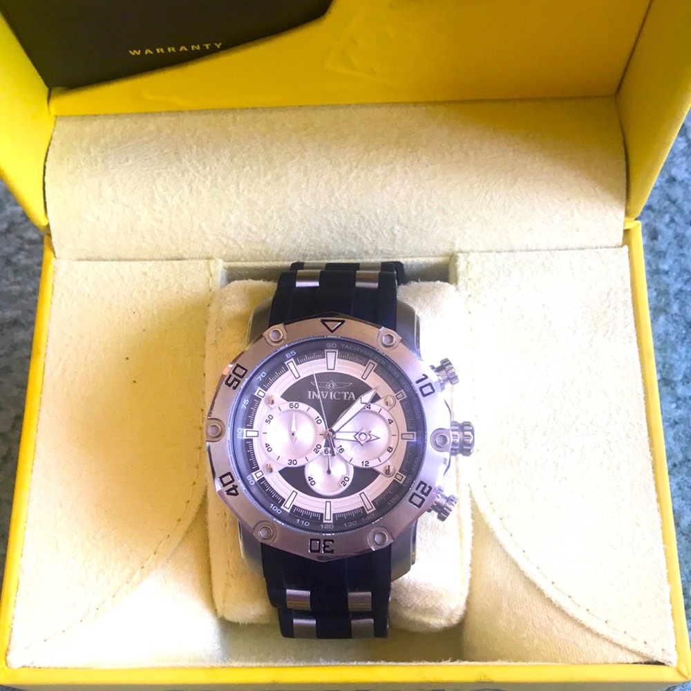 Very handsome black and steel watch.